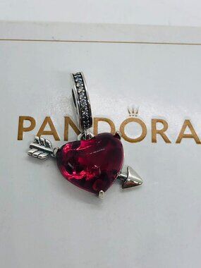 Pandora pink Cupid's heart charm An arrow through the heart charm